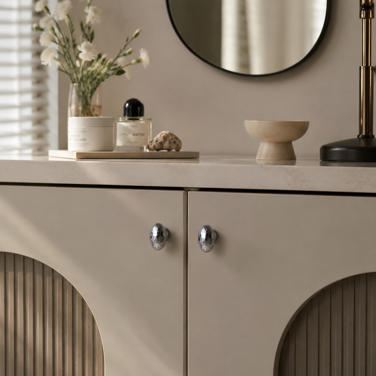 Decorative oval cabinet knob in use