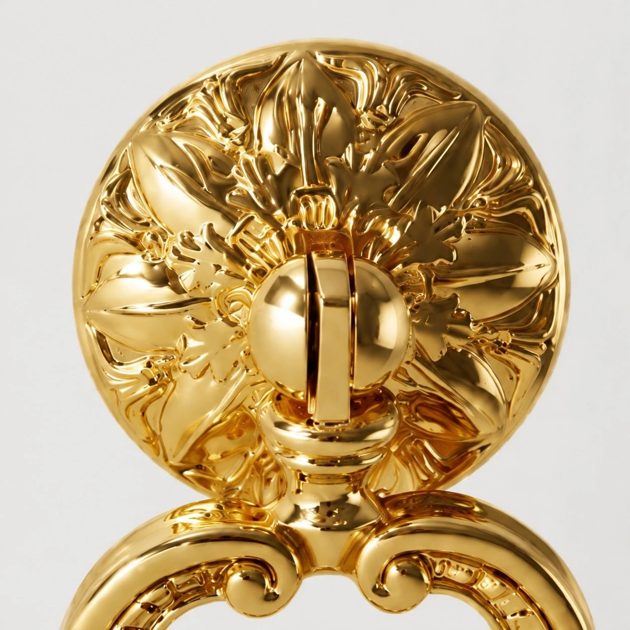 Close detail of the floral brass backplate