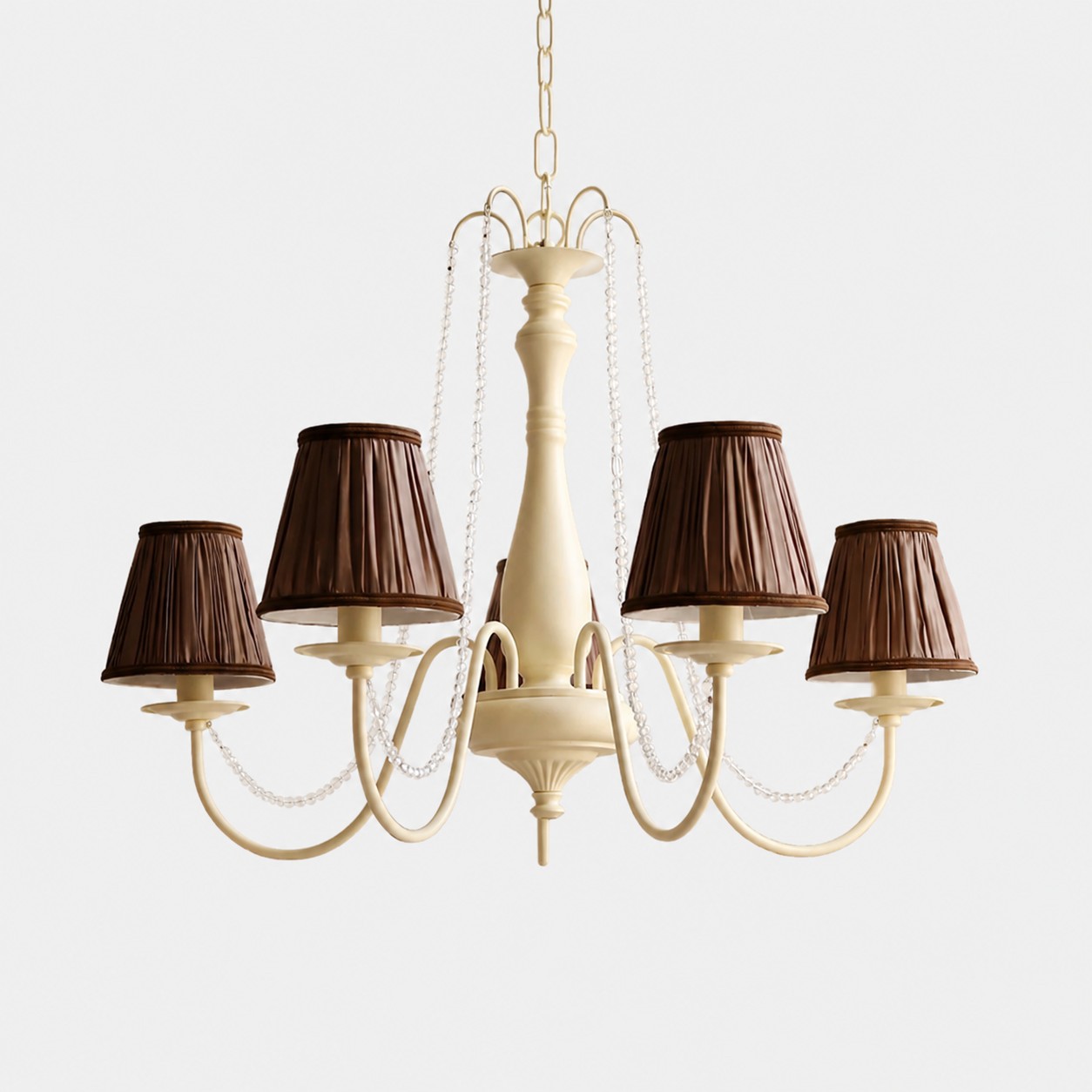 Front view of French five-light chandelier with brown fabric shades and crystal bead swags