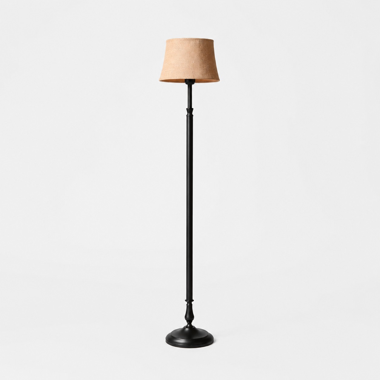 Vintage black iron floor lamp with natural linen shade