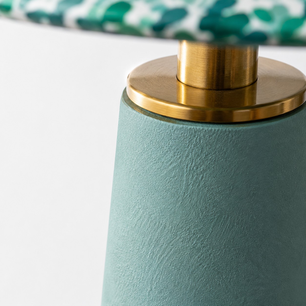 Close view of the metal connector and ceramic body texture
