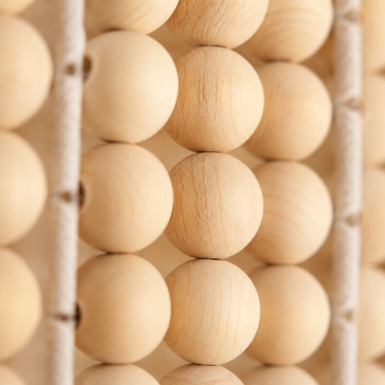 Natural wood bead texture close up