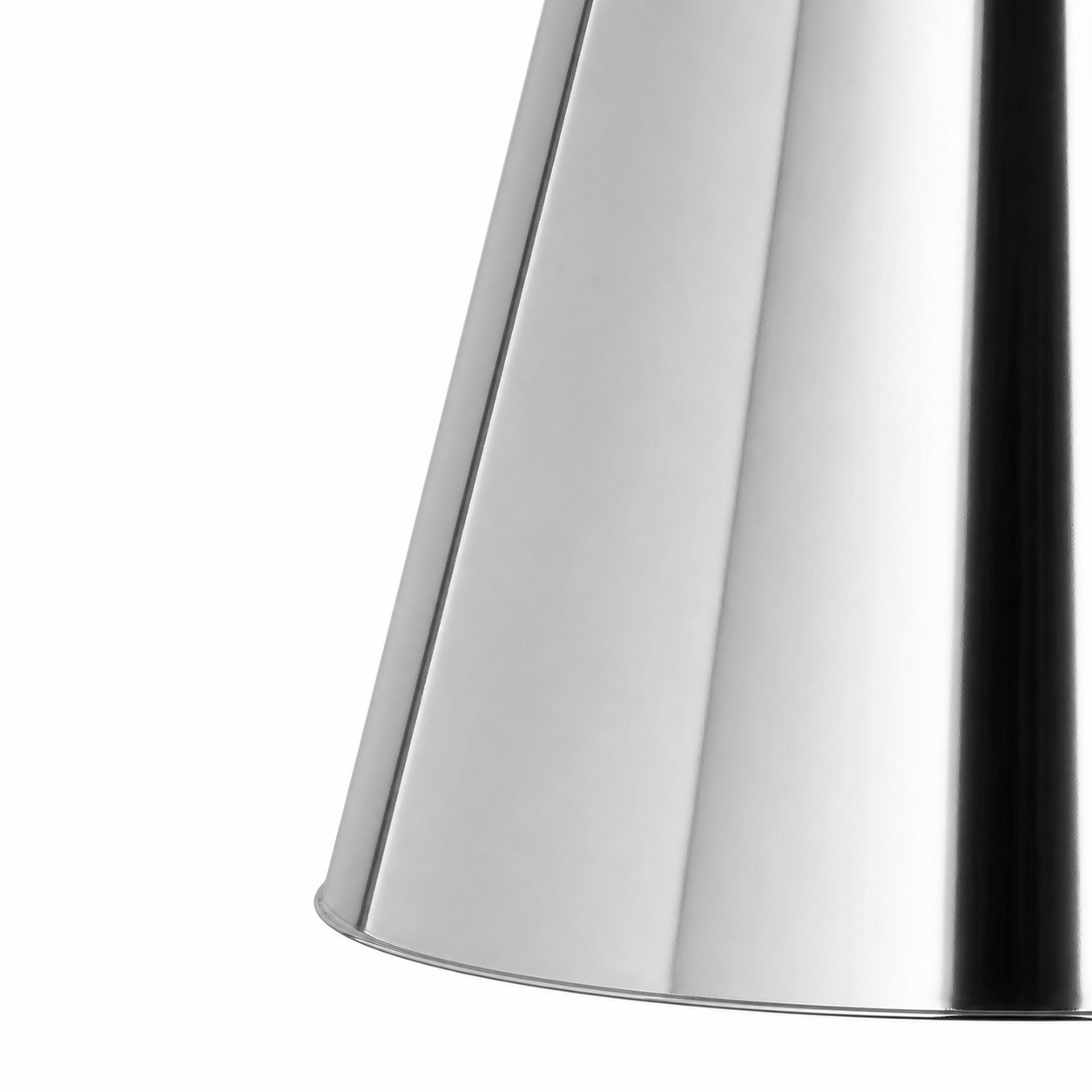 Close-up of the polished chrome brass shade surface and rolled edge