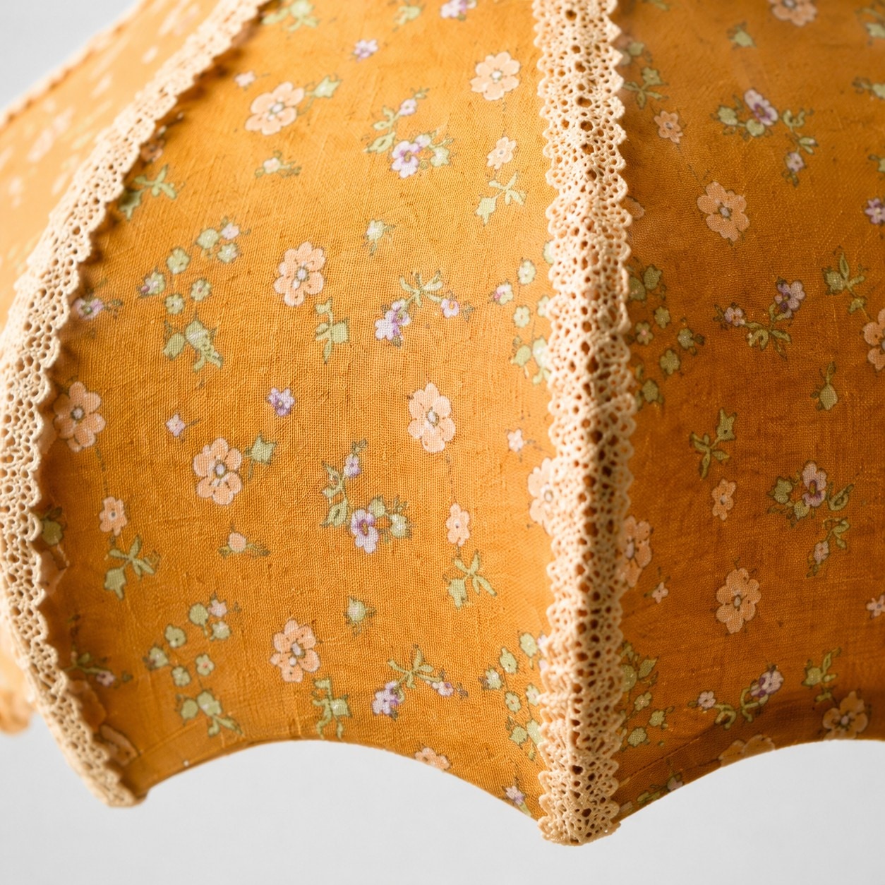 Autumn floral textile and lace trim detail