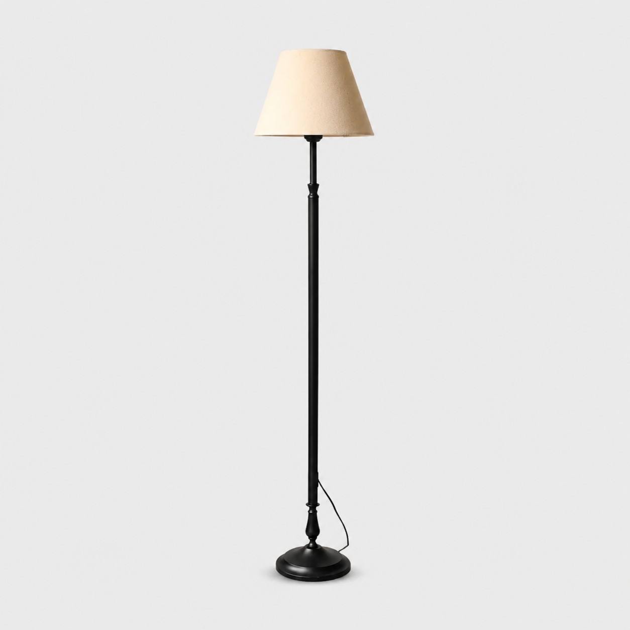 Vintage black iron floor lamp with deep beige fabric shade