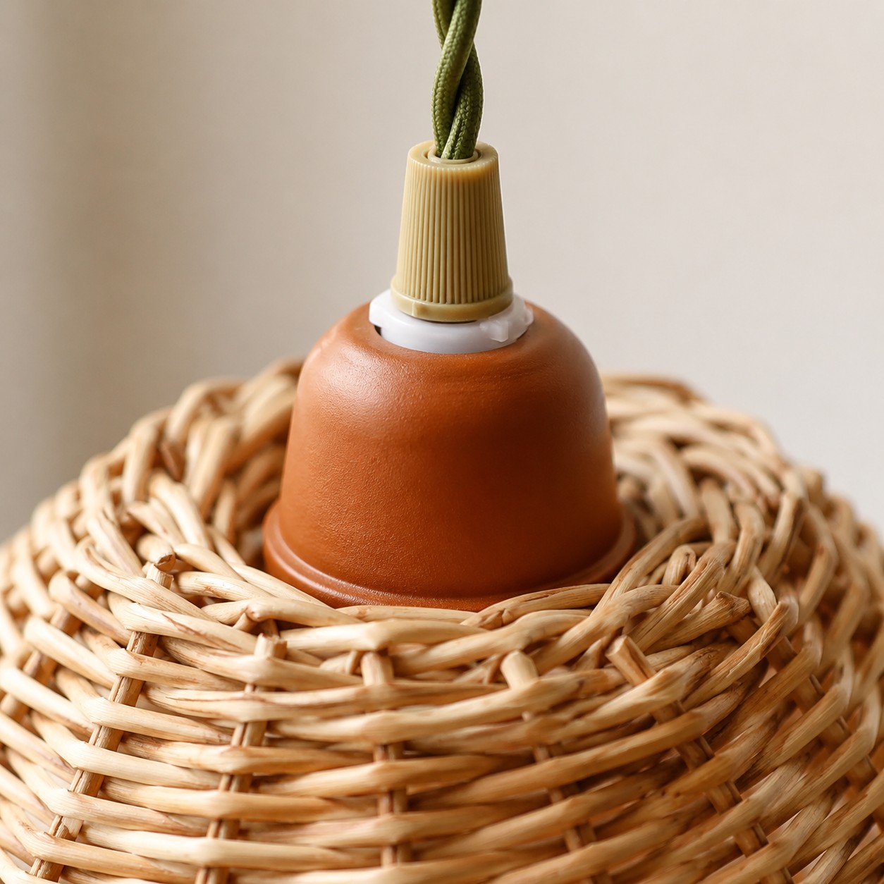 Pendant lamp top fitting and woven rattan shade detail