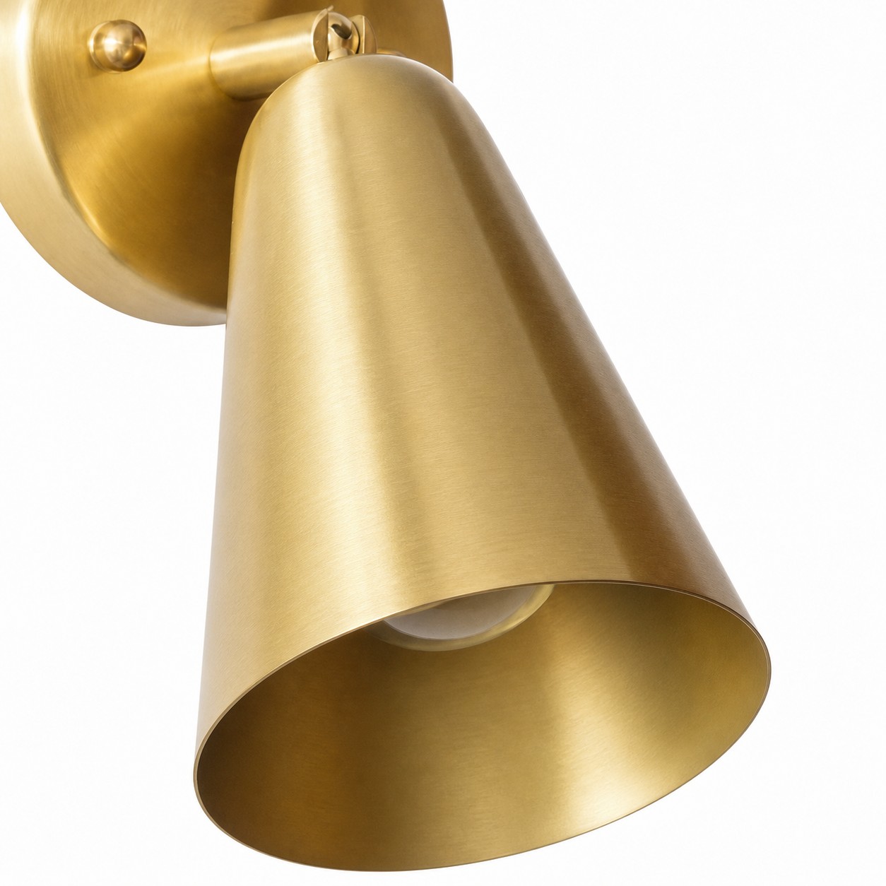 Close-up of natural brass cone shade