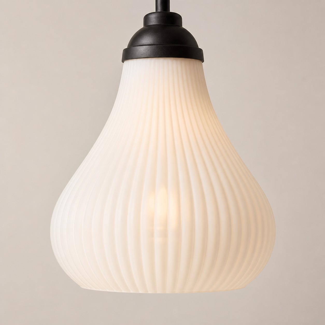 Close view of ribbed glass chandelier shade