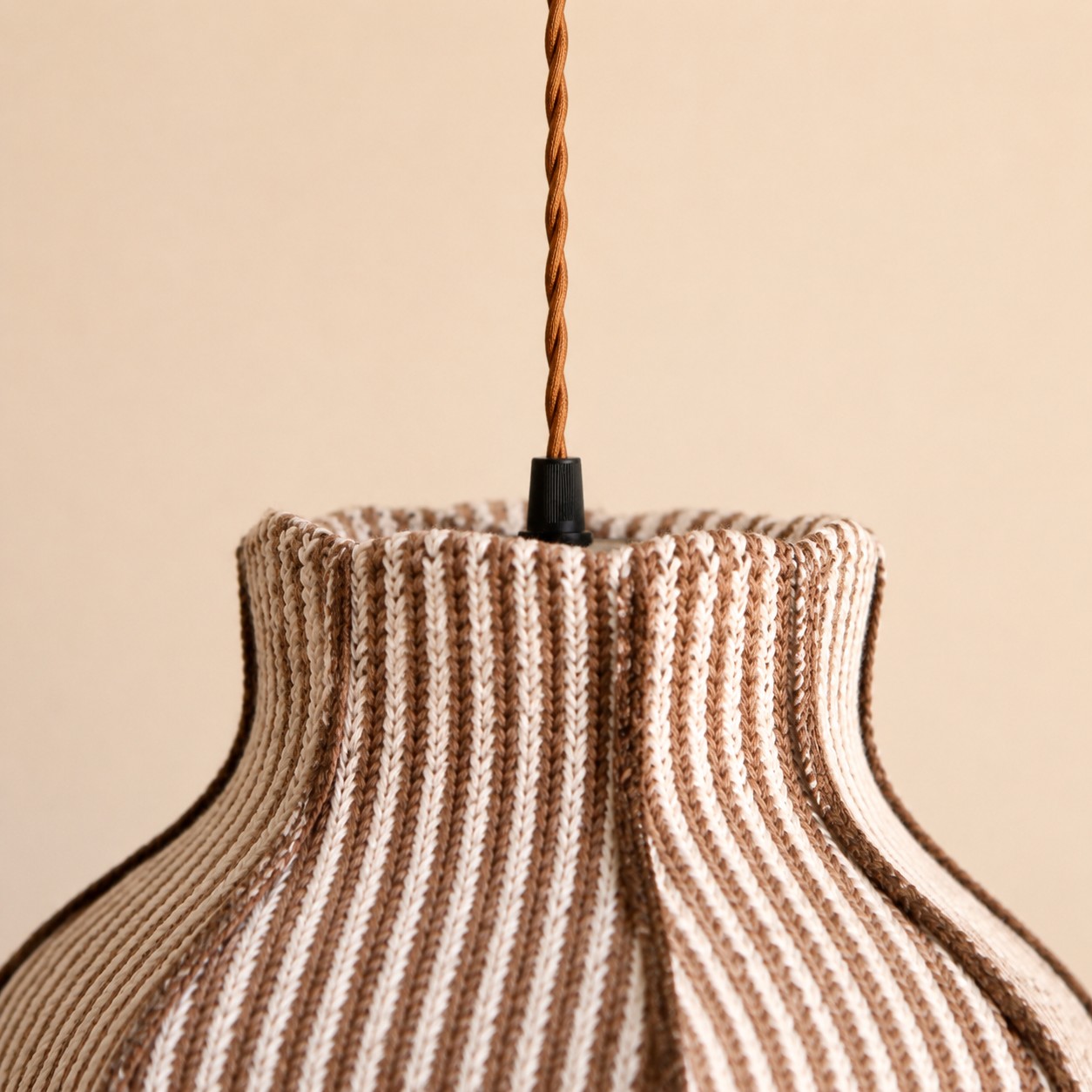 Twisted cord and upper shade connection detail