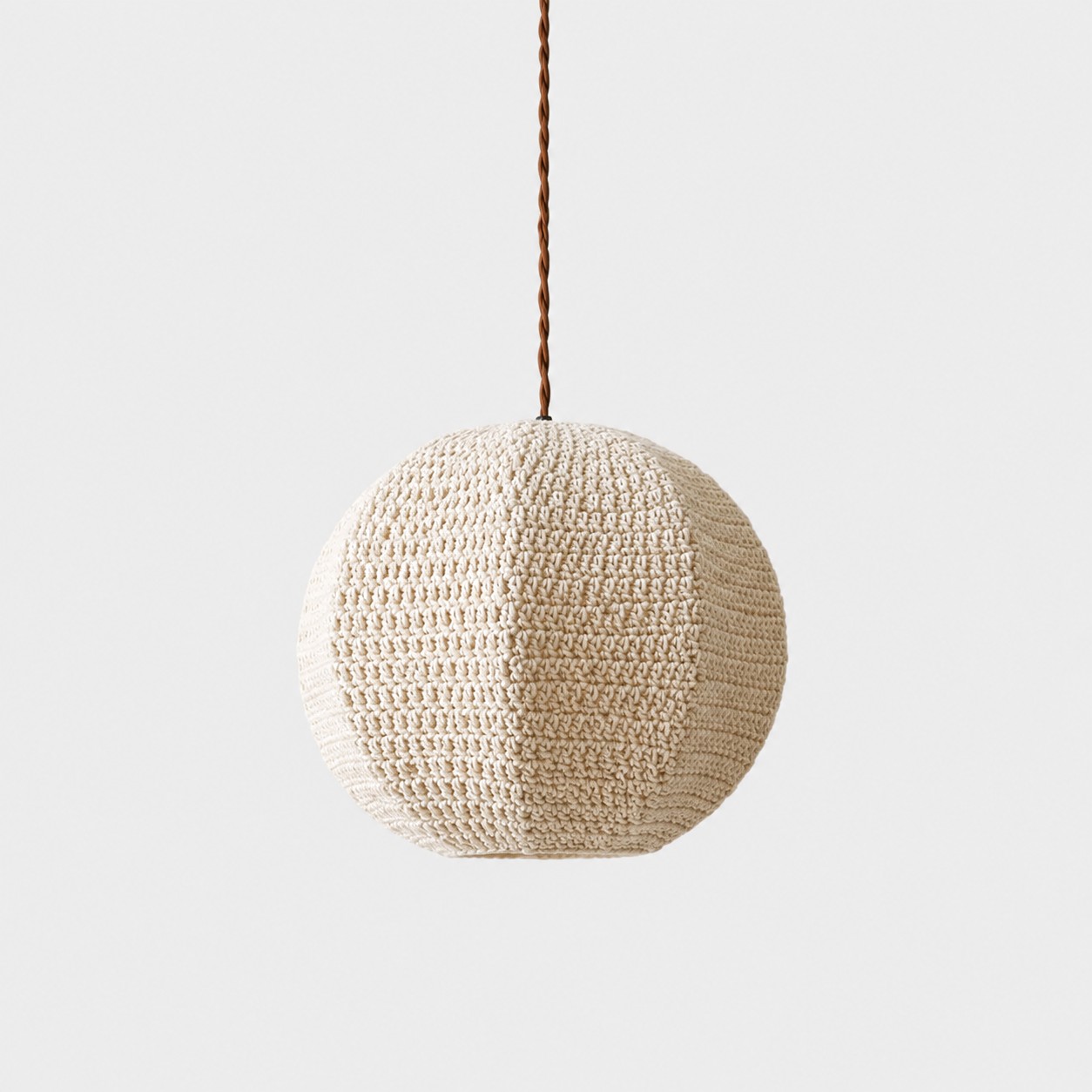 Ivory 28 cm handwoven globe pendant light shown from the front
