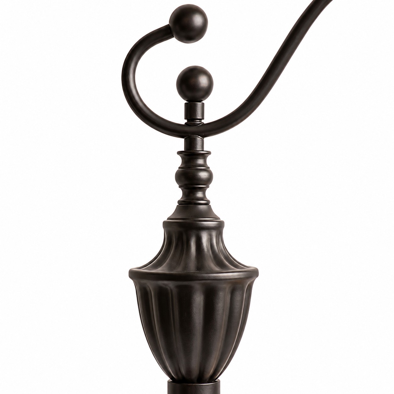 Close-up of the curved black metal lamp arm and sculpted upper post