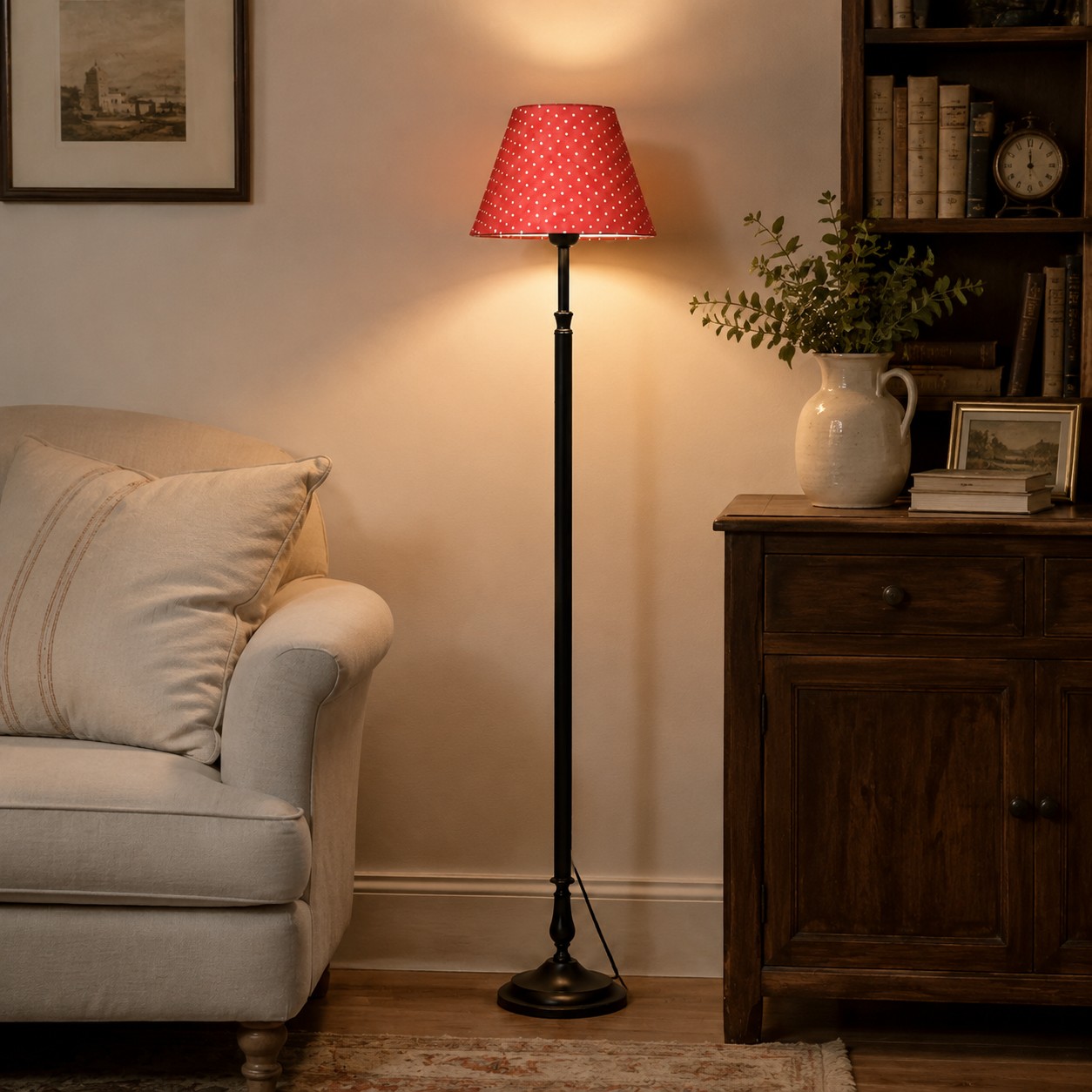 Vintage black iron floor lamp beside an upholstered chair in a warm living room