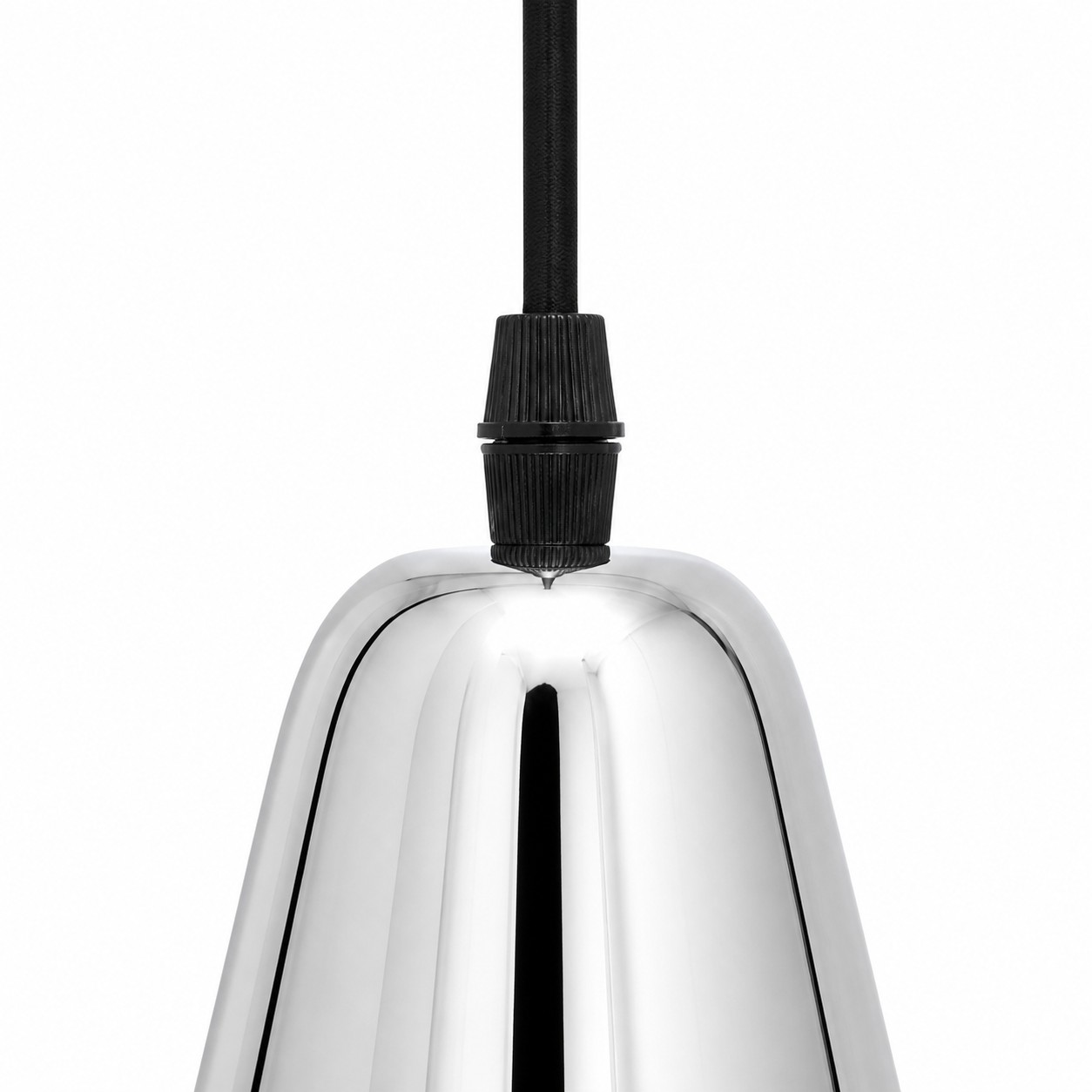 Close-up of the black socket holder and chrome brass shade connection