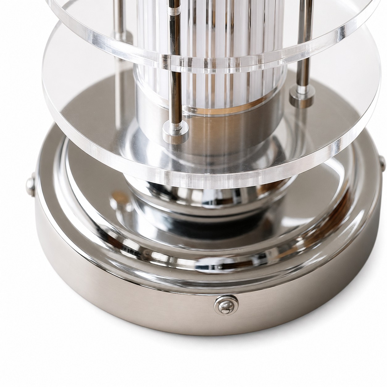 Clear acrylic and chrome ceiling lamp base close detail