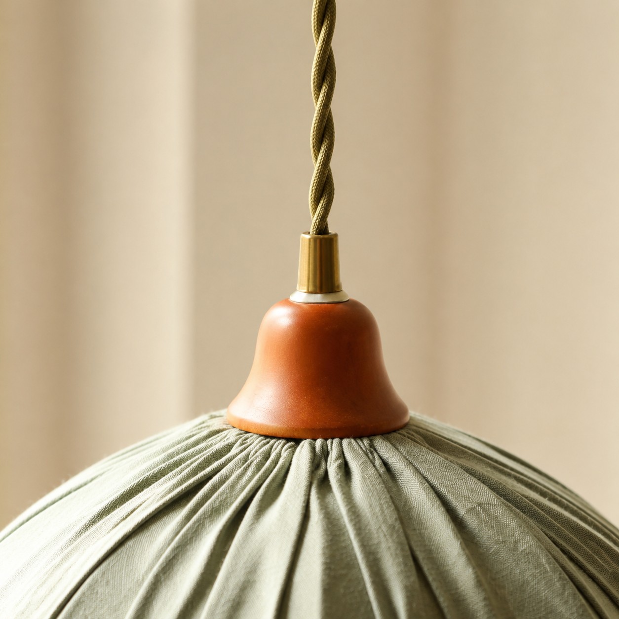 Close view of pendant cord and ceiling detail